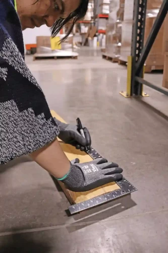 Worker Wearing Samurai Safety Gloves
