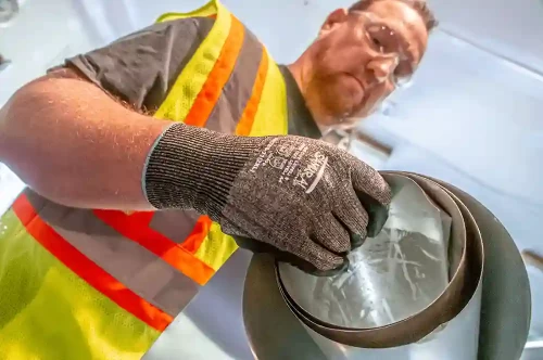 Worker Wearing Samurai Safety Gloves
