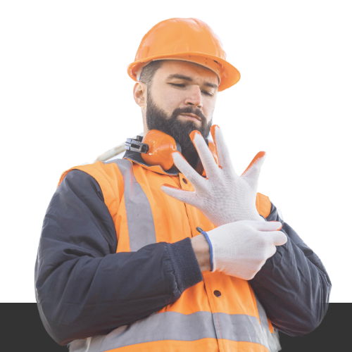 Worker putting on safety gloves