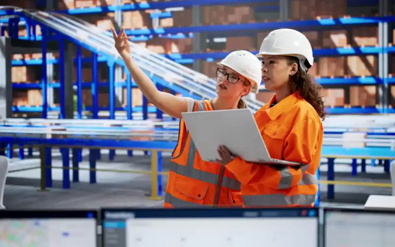 Two Women Workers Conducting Facility Safety Audits