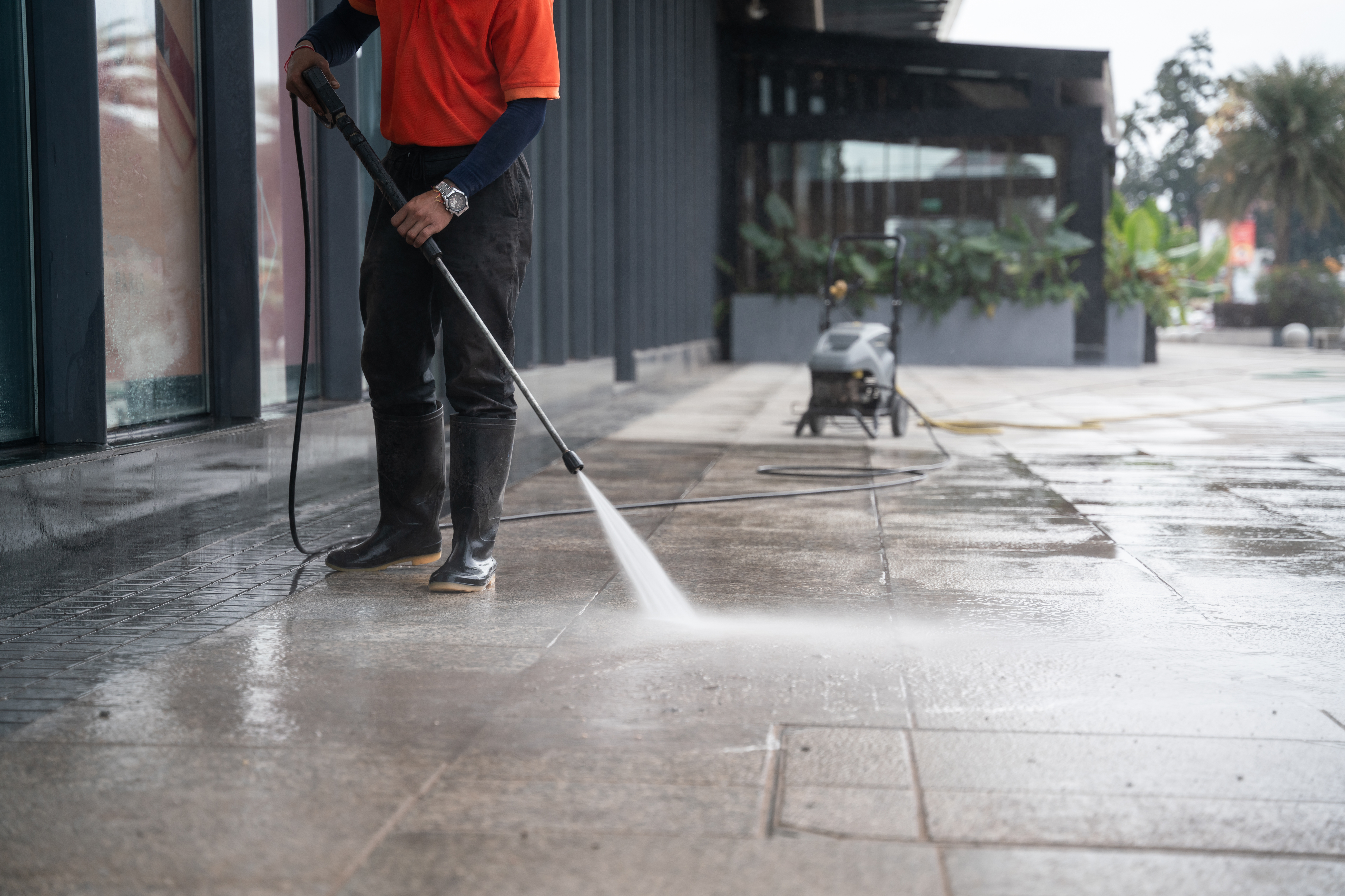 Commercial pressure washing service cleaning building exterior in South Carolina