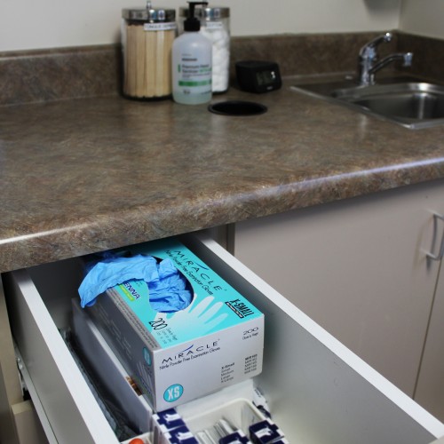 gloves in a cabinet