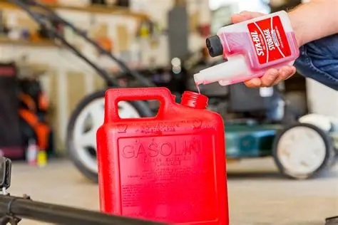 someone adding Sta-Bil to a gas can