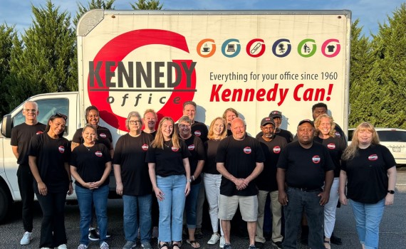 Kennedy team in front of van