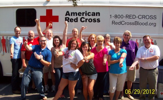 Kennedy team in front of Red Cross