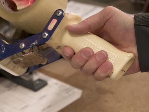 cattongue_grip_clear_multi_purpose_roll_in_use