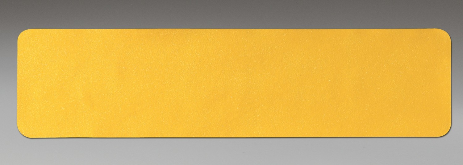 7220-01-648-1779 - A 6" x 24", yellow, high-friction, mineral-coated, slip-resistant material that has a special pressure-sensitive adhesive backed aluminum film that conforms around corners and adheres to irregular surfaces. Peel-and-stick nonskid tapes and treads are conformable, slip-resistant, and intended for irregular or contoured surfaces in light to heavy shoe-traffic areas. This conformable nonskid material is available in a safety yellow color for high visibility and easy identification of hazard areas. Product applications include: stairs, ladders, loading ramps, platforms, irregular surfaces like diamond plating or flat surfaces with rivets or screw heads. UOI is BX. BX = (50) 6" x 24" pieces.