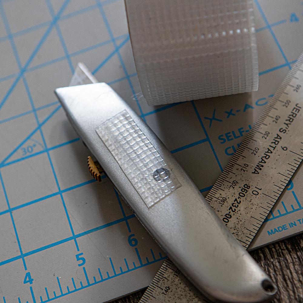 cattongue_grip_clear_multi_purpose_roll_in_use_2