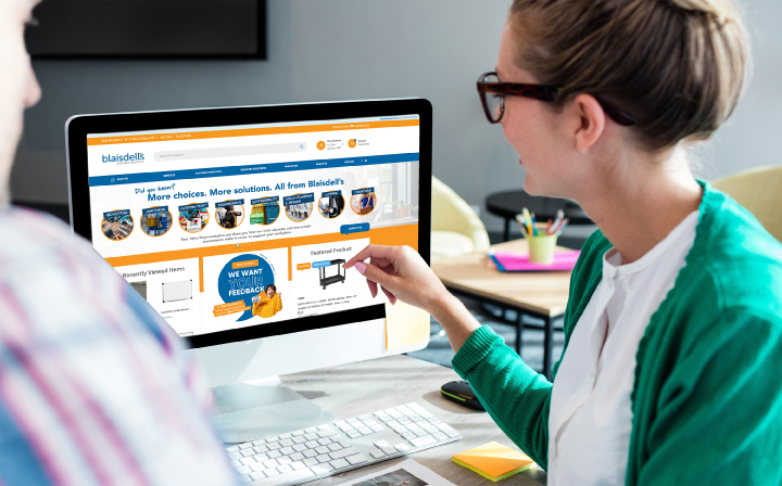 Woman using blaisdells.com to shop for office products