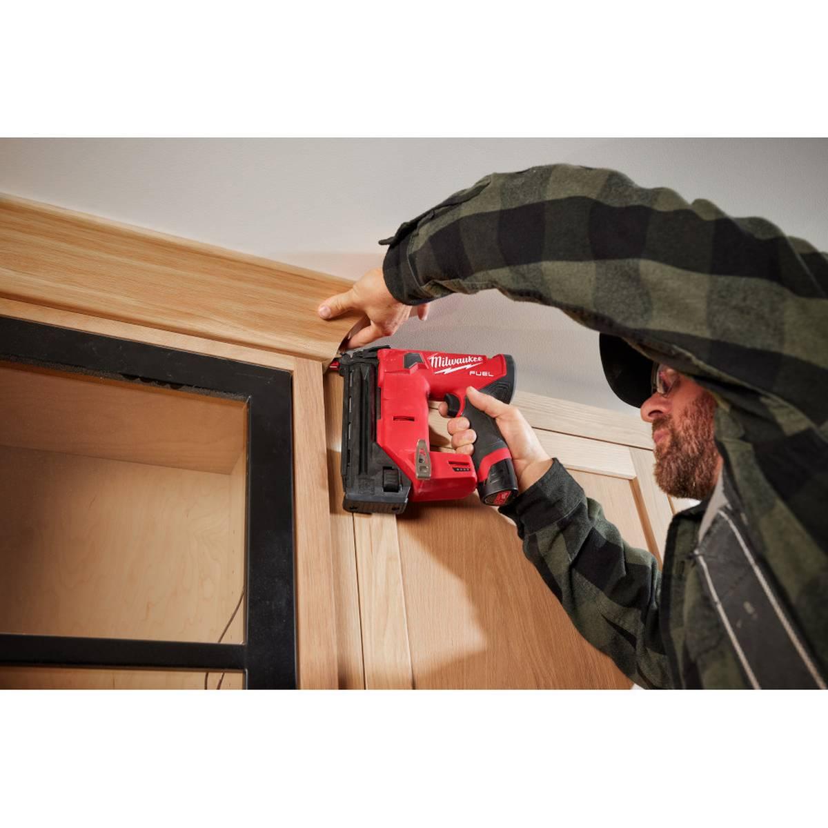 M12 FUEL 12-Volt Lithium-Ion Brushless Cordless 18-Gauge 1-1/2 in Compact Brad Nailer In use Alt #3