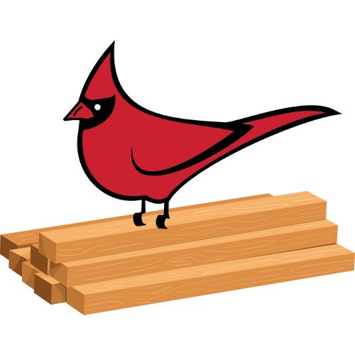 Cardinal bird sitting on top of a stack of lumber