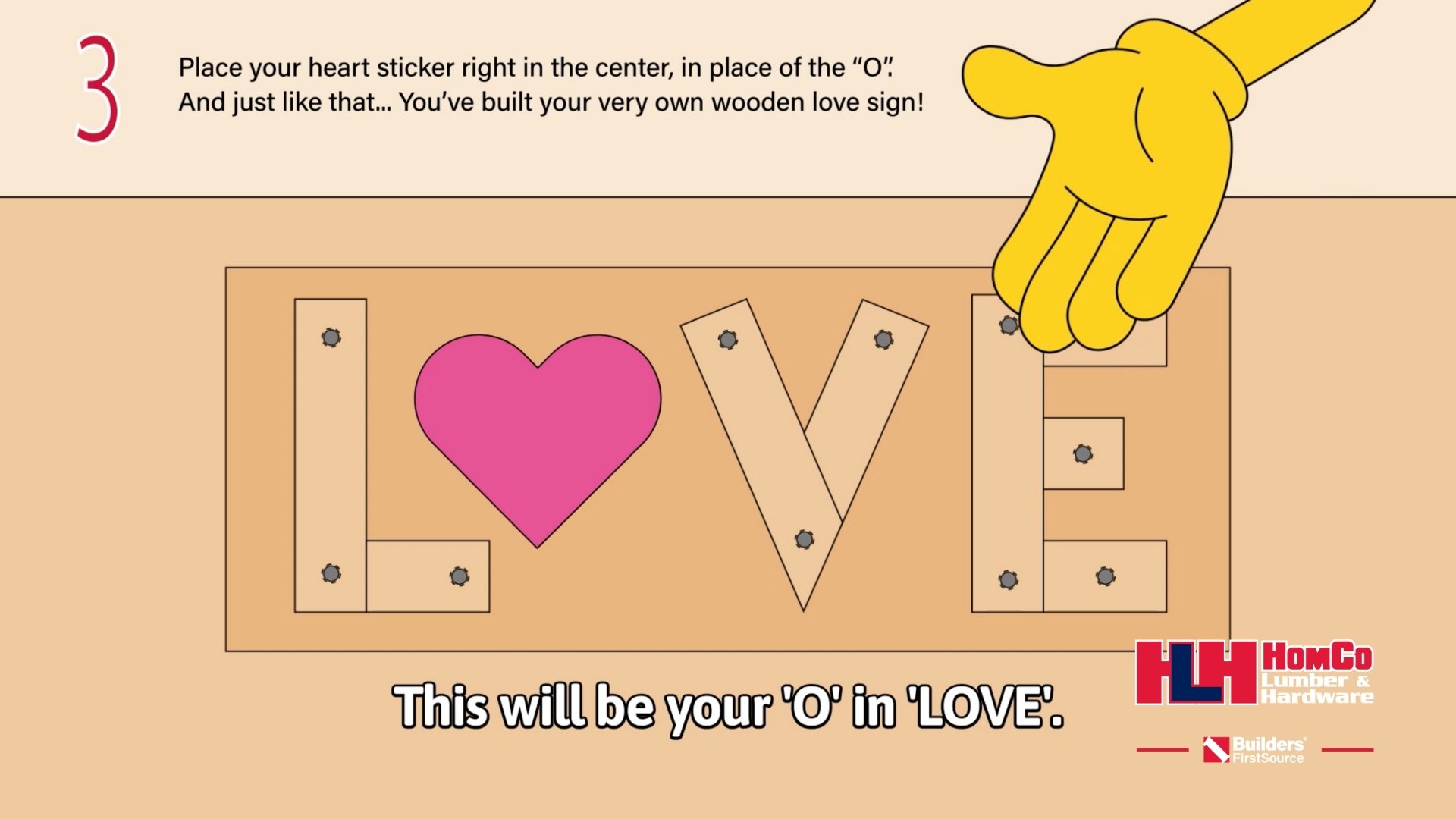 Young Builders wooden LOVE sign step 3 adding heart sticker as the letter O