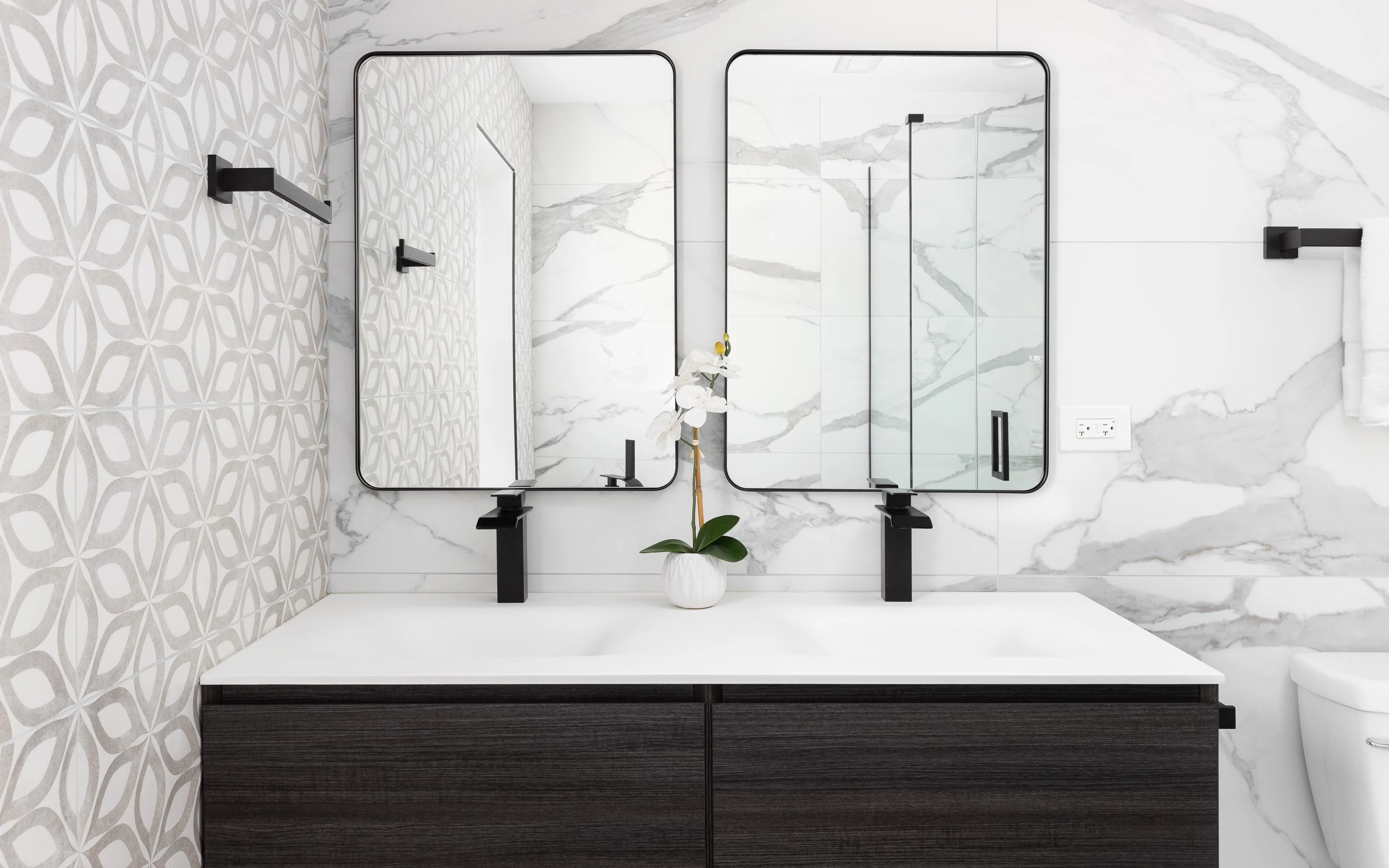 Modern bathroom vanity combo with double sink, marble wall backdrop, and storage drawers for organization