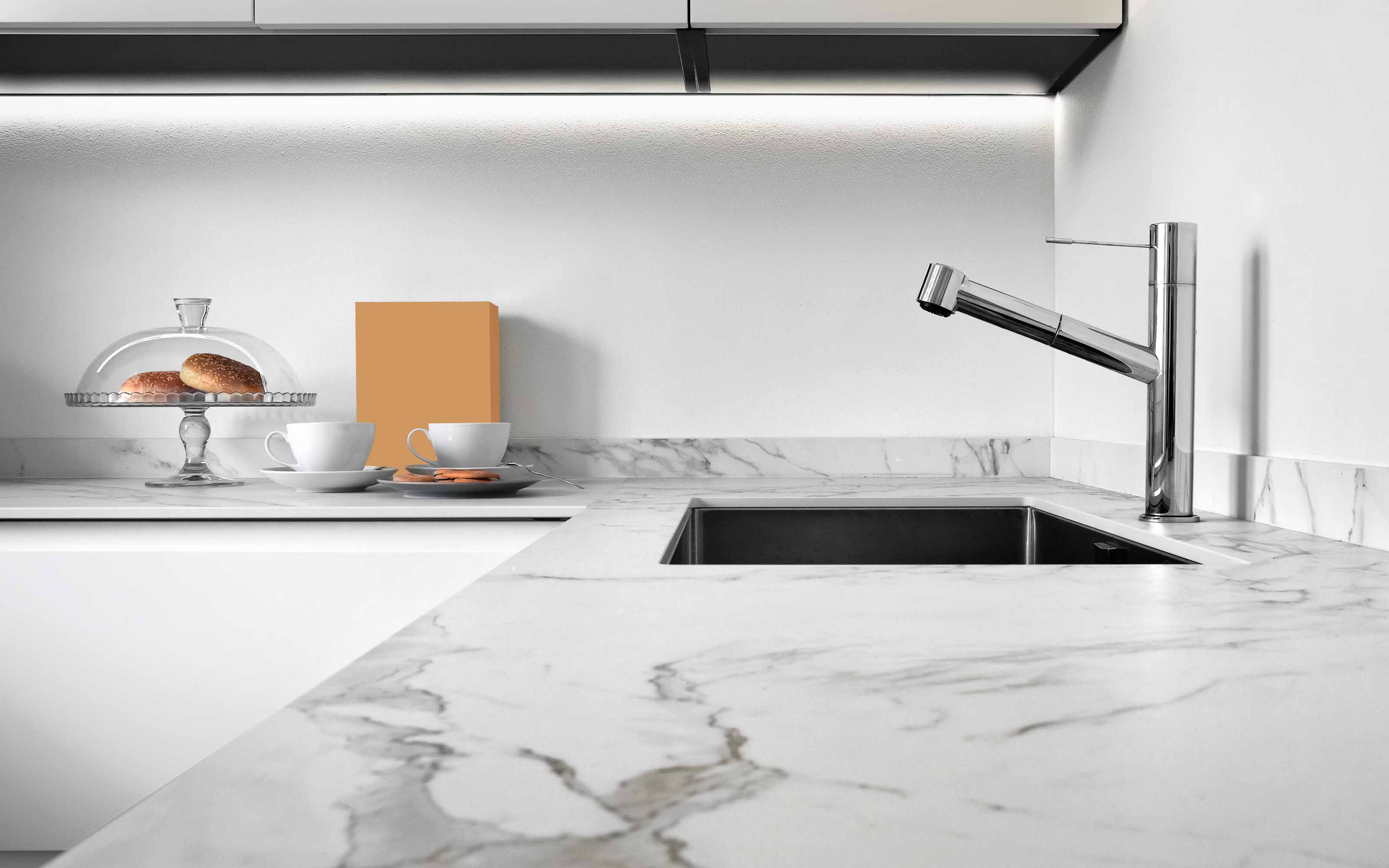 Modern quartz countertops installed in a stylish kitchen designed for durability, low maintenance, and everyday functionality
