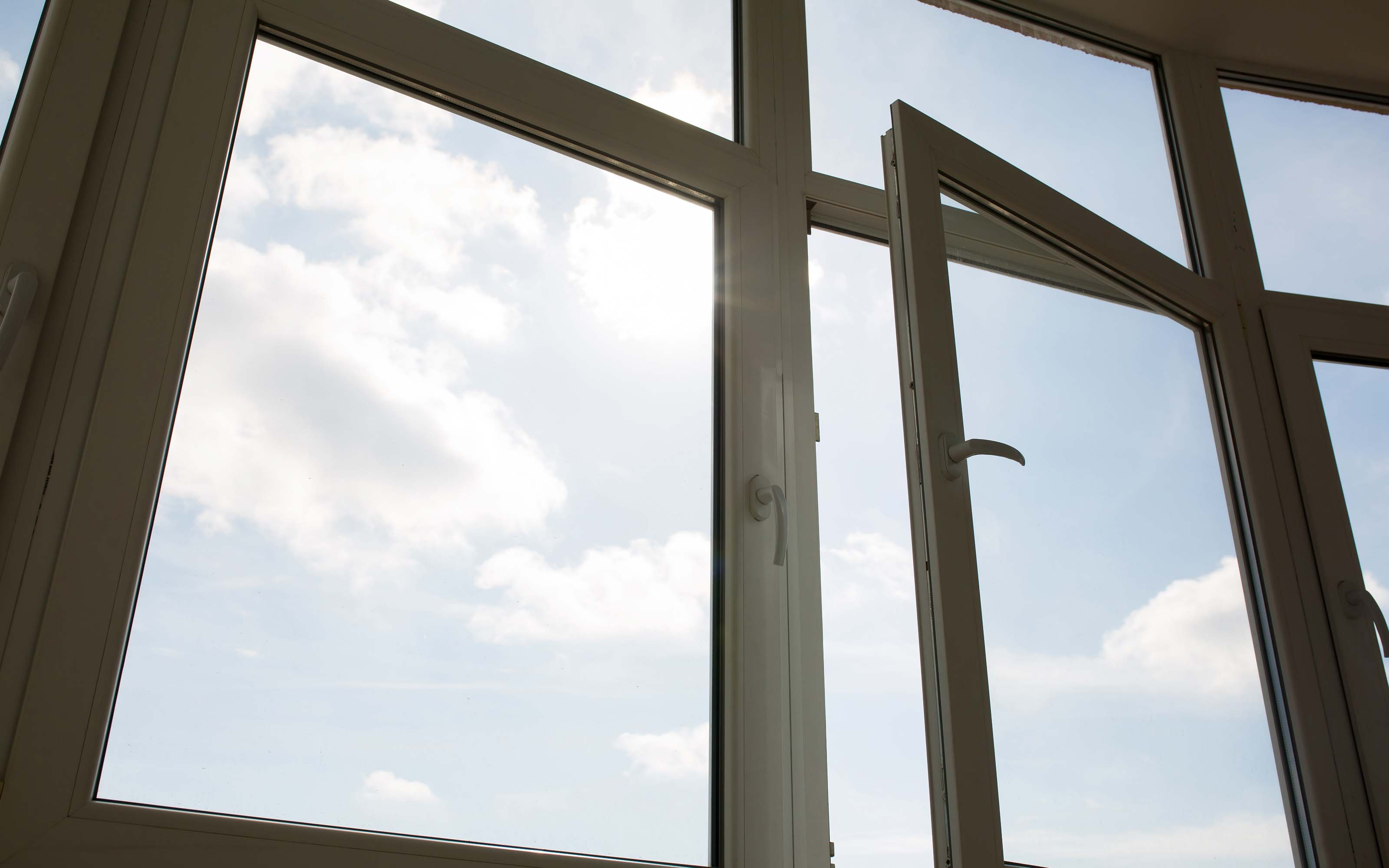 Modern home interior with vinyl windows designed to reduce outside noise and improve indoor comfort