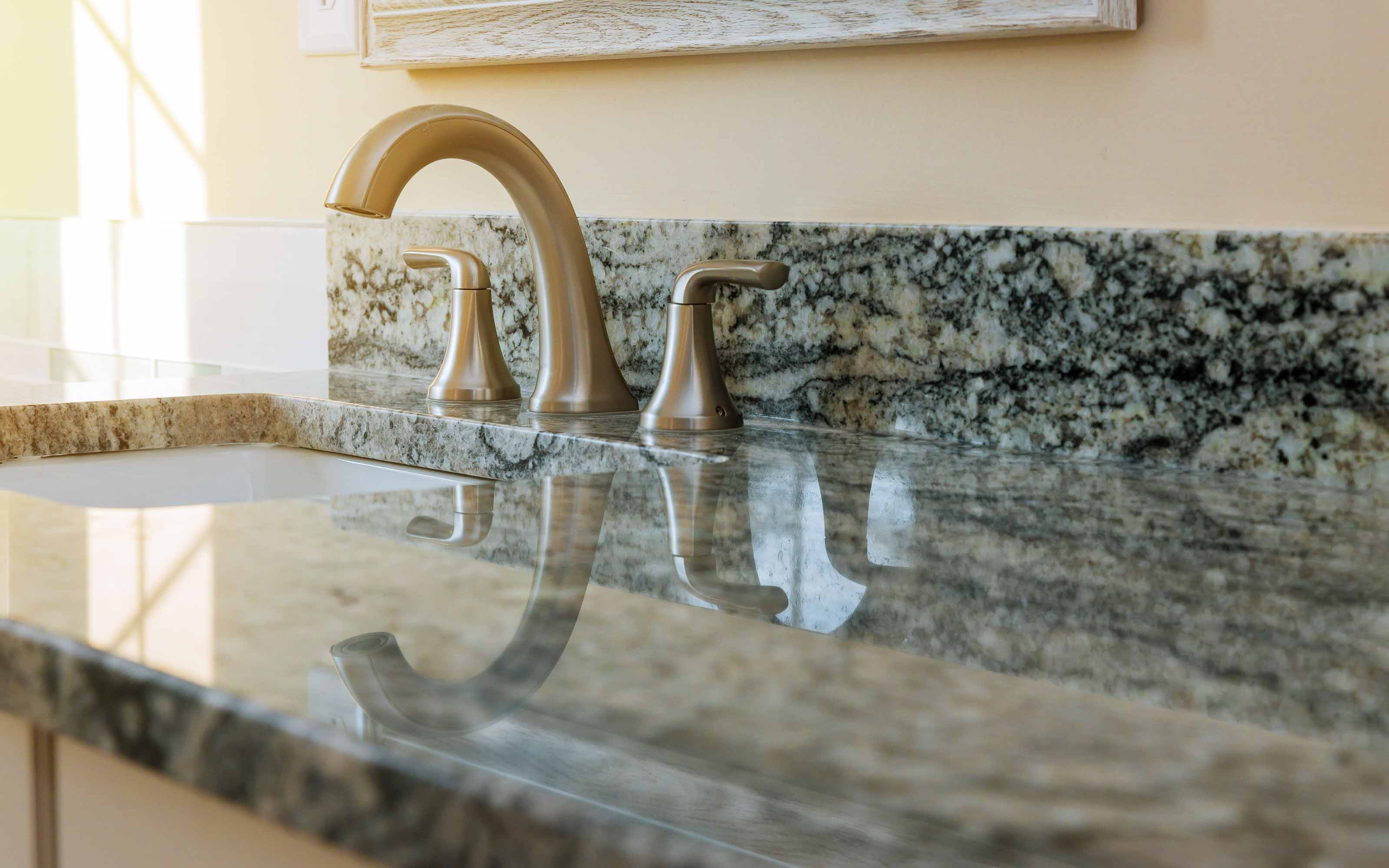Elegant natural granite countertops installed in a modern kitchen designed for durability, style, and long-term value