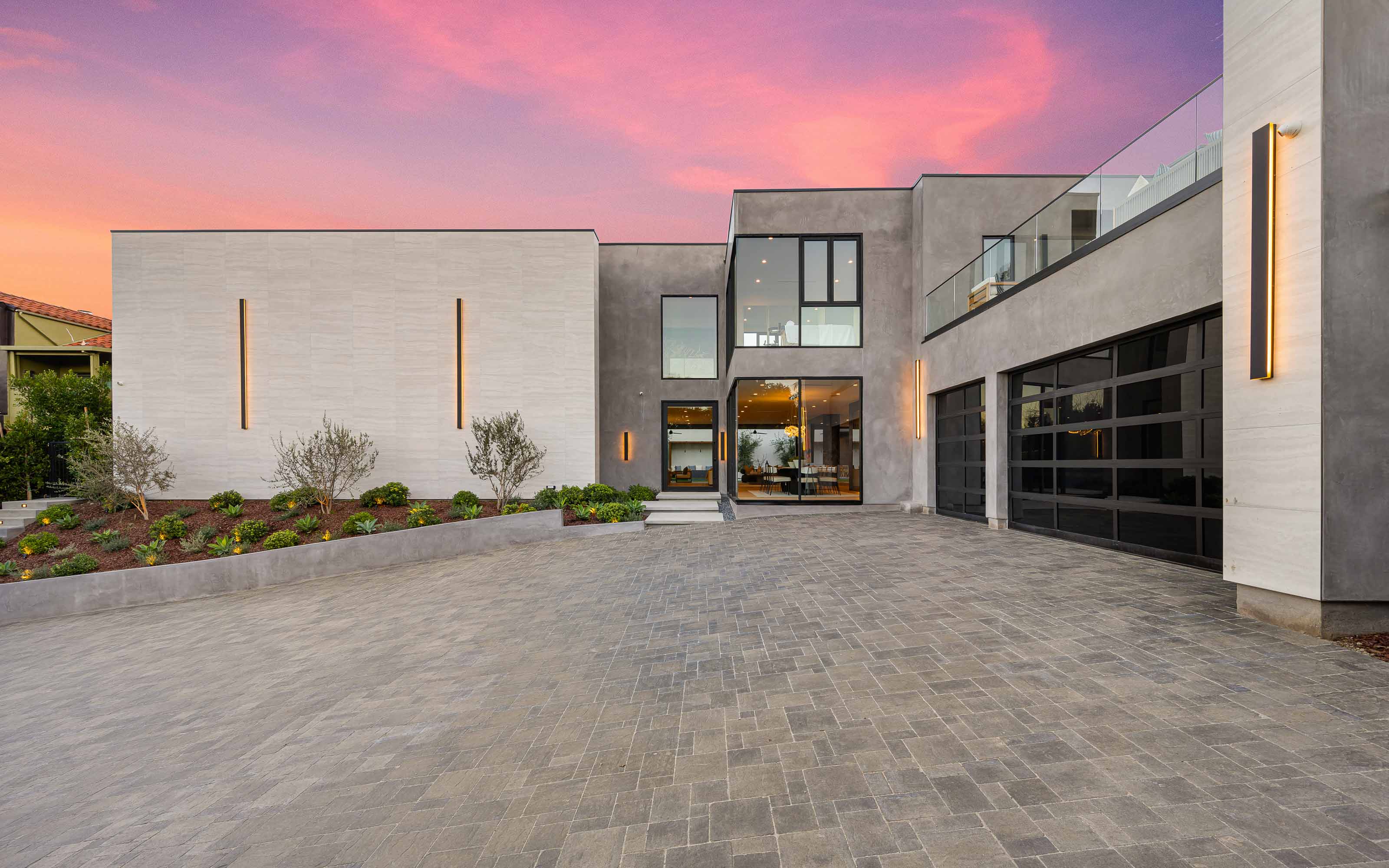 Contemporary home with slim frame aluminum windows providing expansive views and abundant natural light