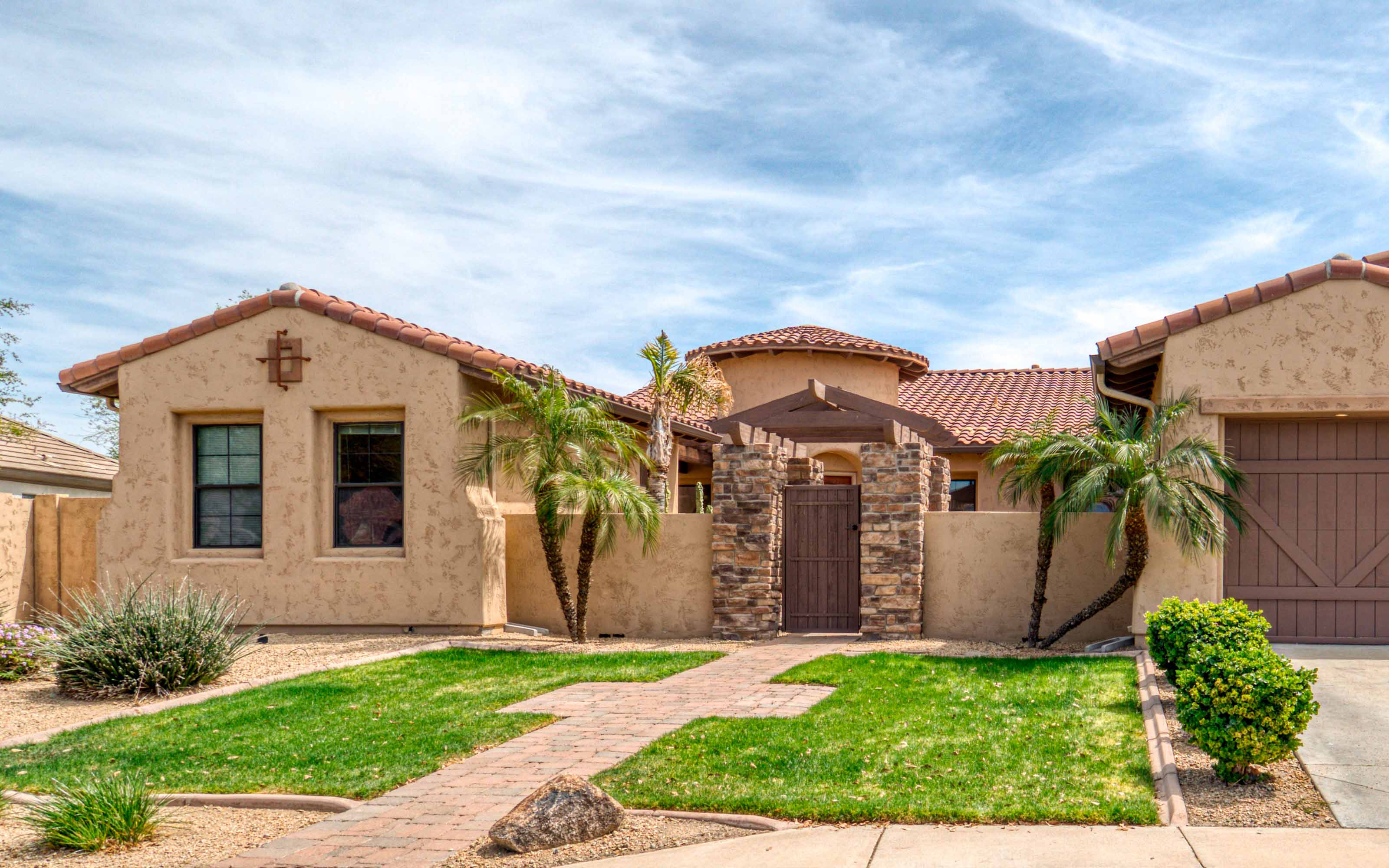 Arizona home with modern energy-efficient windows designed to withstand extreme heat, UV exposure, and desert climate conditions
