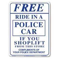 SIGN RIDE IN A POLICE CAR