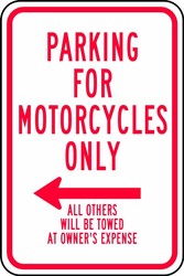 Traffic Sign: Parking For Motorcycles Only (Left Arrow) All Others Will Be Towed At Owner's Expense